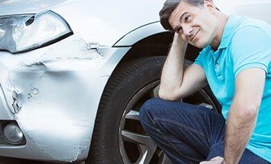 Inspecting Damage after Car Accident — Collision Repair in Portland, OR