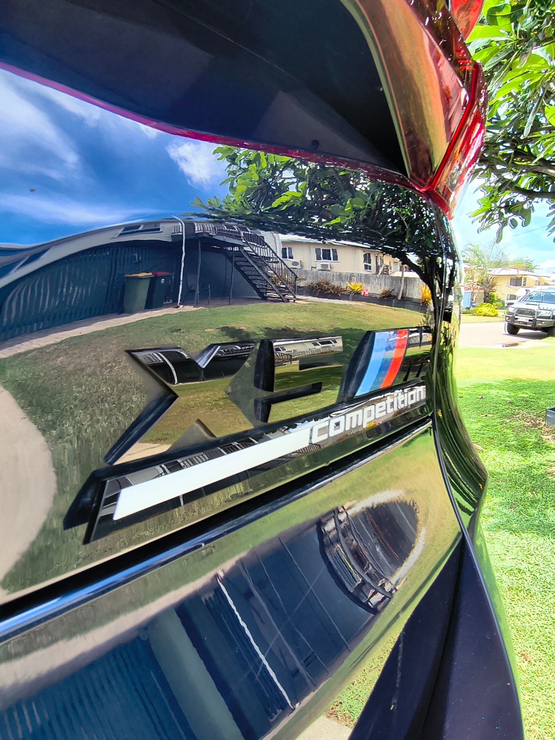 Black Bmw X Series Rear With "M" Color Stripes Badge — Best Car Detailing in Vincent, QLD