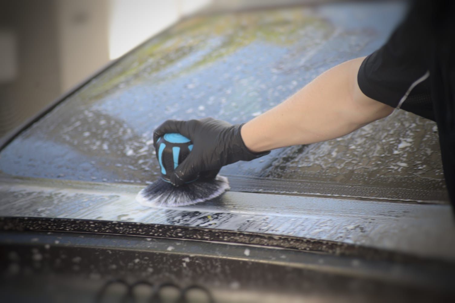 A Jeep is Parked in Front of a House — Best Car Detailing in Vincent, QLD