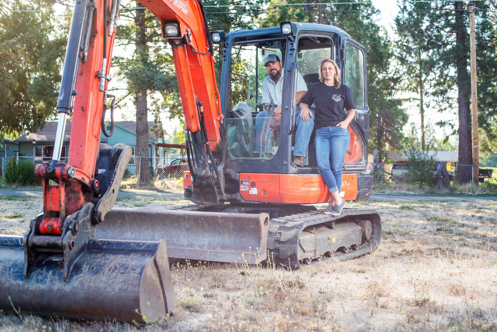 Excavator operator in Medford, Oregon who is clearing land for home site.