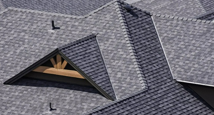 A close up of a roof with a triangle shaped roof.