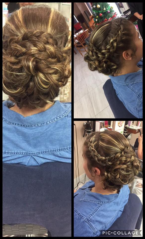 A Woman is Sitting in a Chair With Her Hair in a Bun — Instyle Hair on B in Berserker, QLD