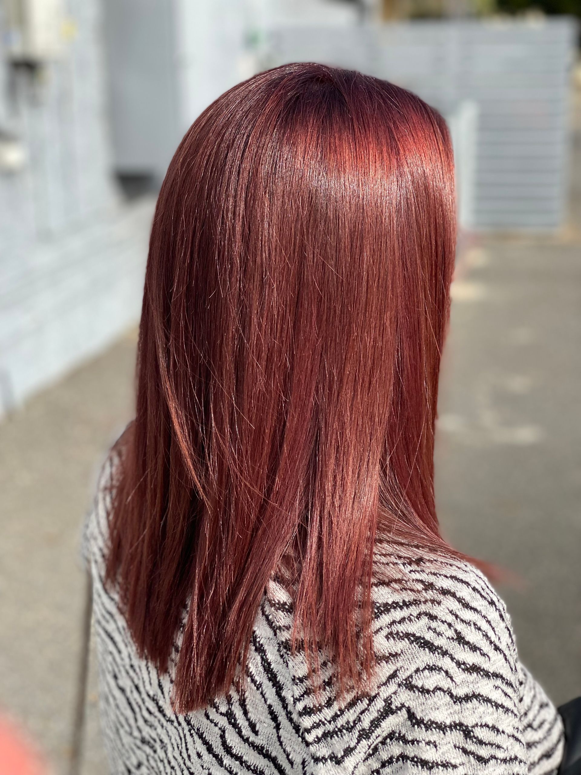 A Woman With Red Hair in a Salon — Instyle Hair on B in Berserker, QLD