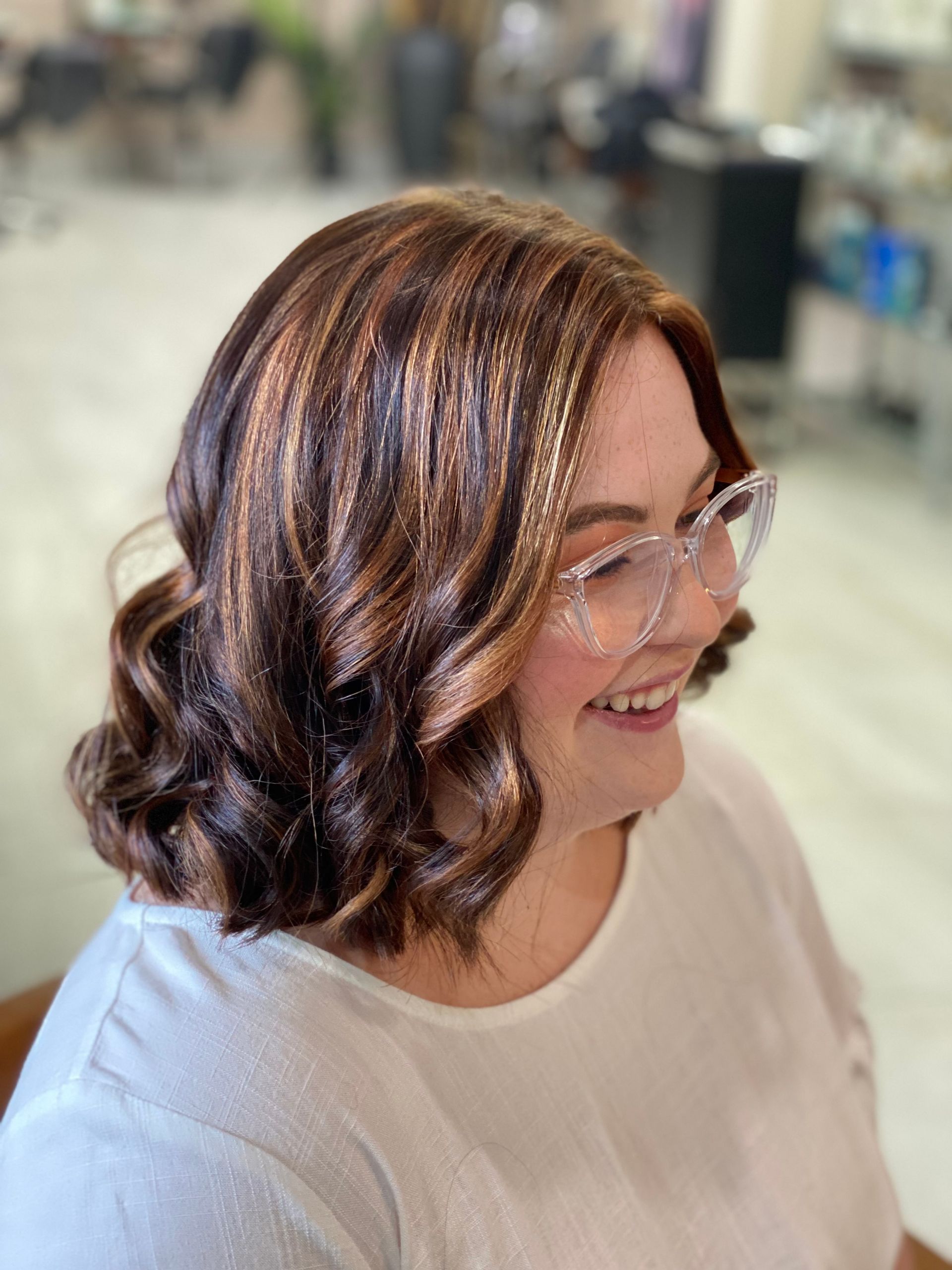 A Woman with Brown Hair & Highlights after Hair Cut — Instyle Hair on B in Berserker, QLD