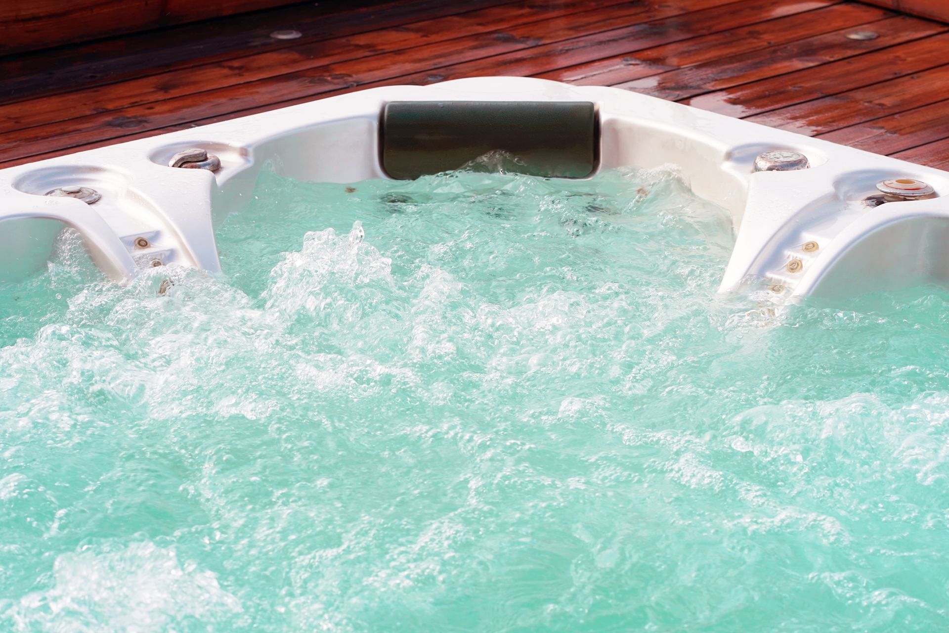 A Hot Tub Is Filled with Water on A Wooden Deck - Provo UT - Spa Doctor
