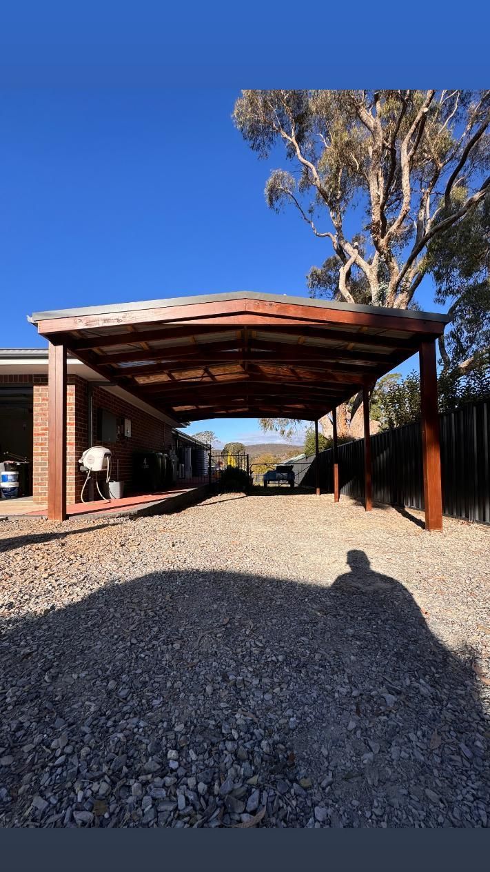 Carport Over Gravel Driveway — J&C Quality Construction in Goulburn, NSW