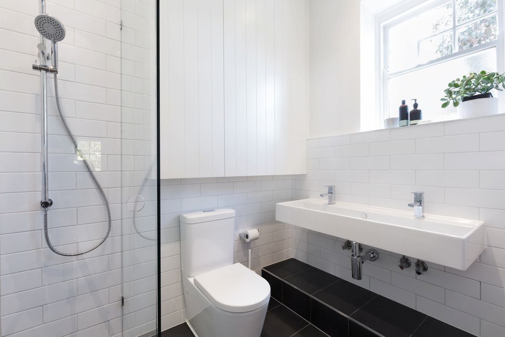 Modern White Bathroom With Shower — J&C Quality Construction in Moss Vale, NSW