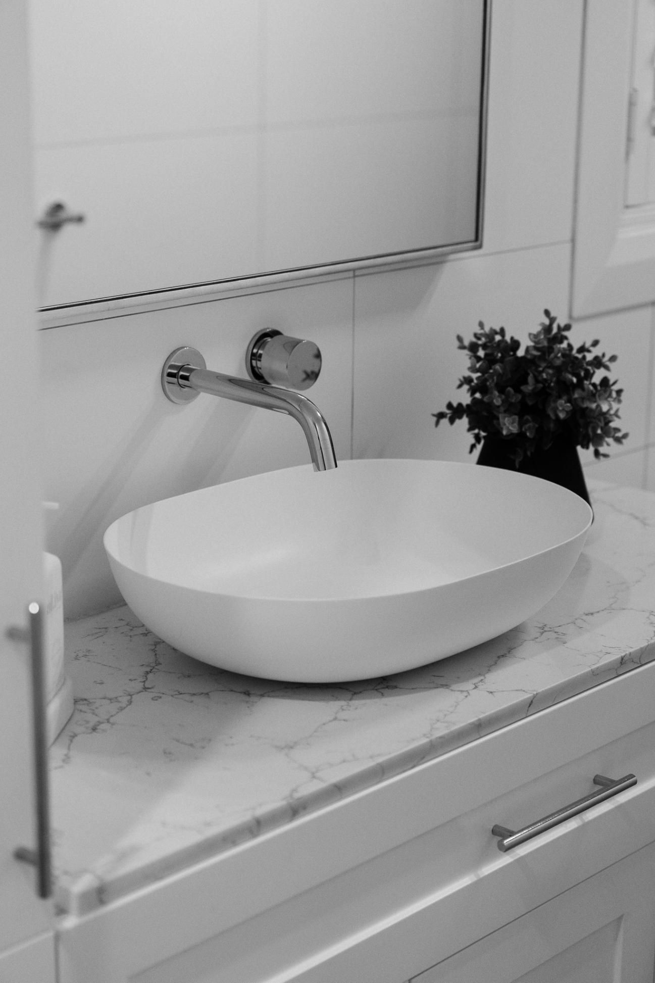 White Oval Sink on Marble Countertop — J&C Quality Construction in Goulburn, NSW