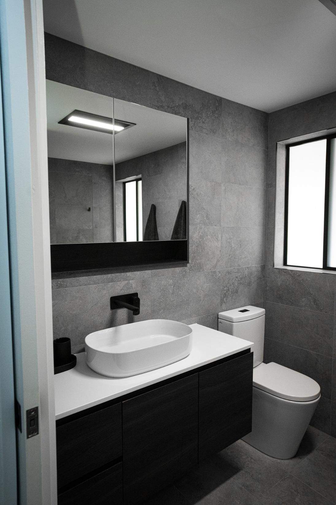 Modern Bathroom With Grey Tile Walls — J&C Quality Construction in Goulburn, NSW