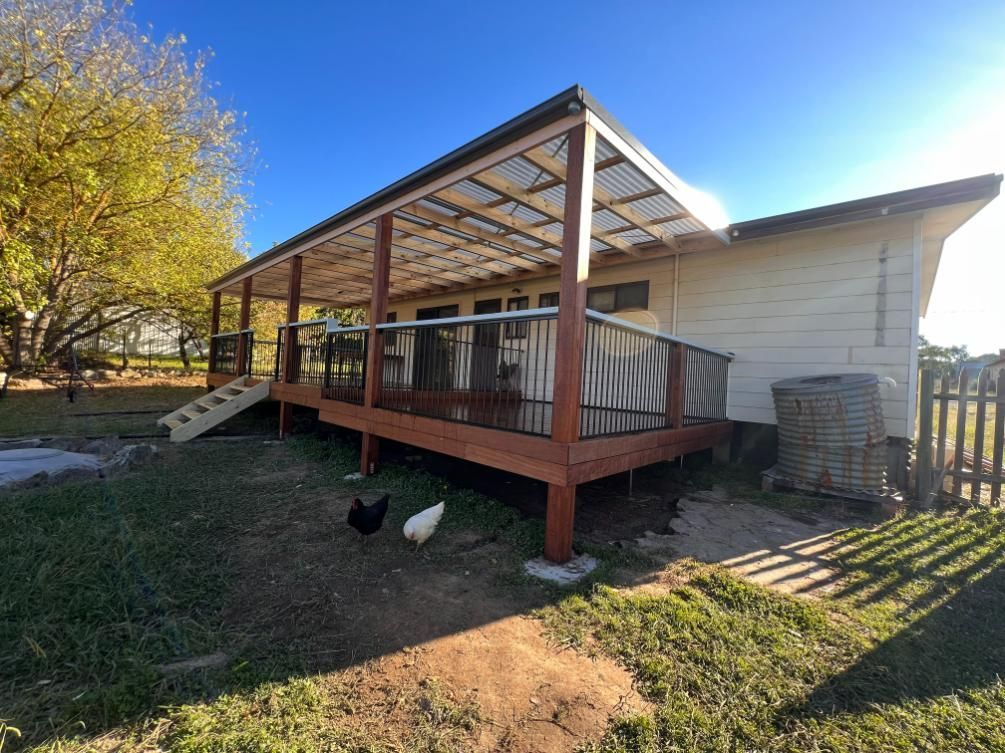 Wooden Deck With a Covered Area — J&C Quality Construction in Goulburn, NSW
