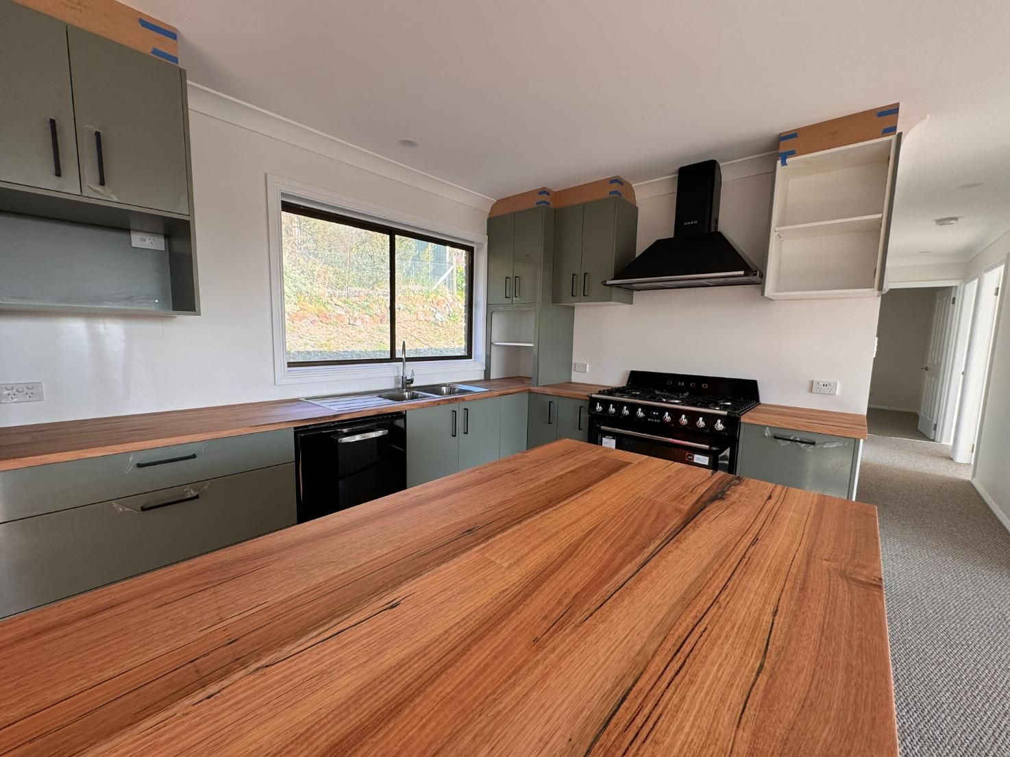 Kitchen With Wooden Countertops — J&C Quality Construction in Goulburn, NSW