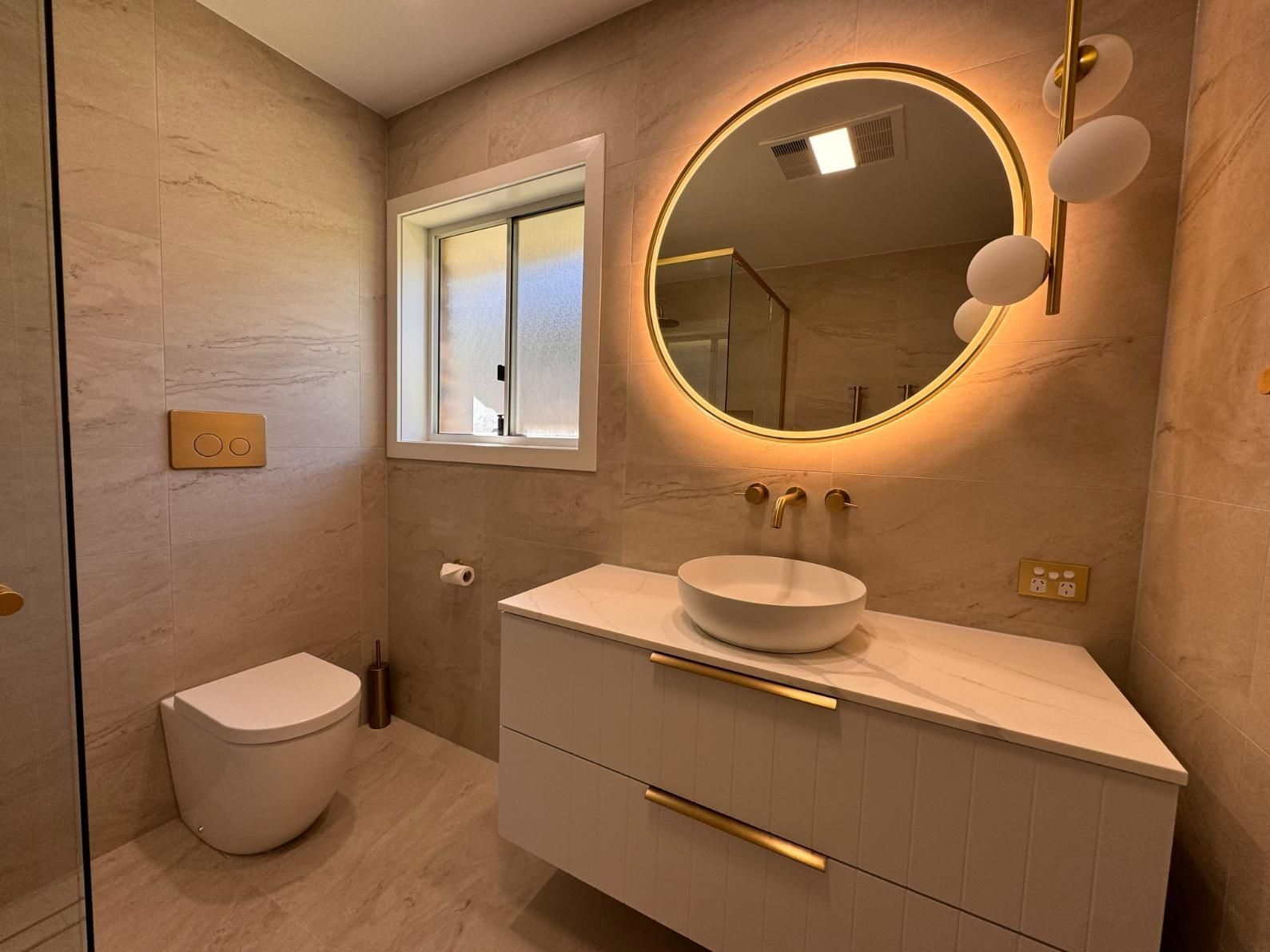 Modern Bathroom With White Vanity — J&C Quality Construction in Goulburn, NSW