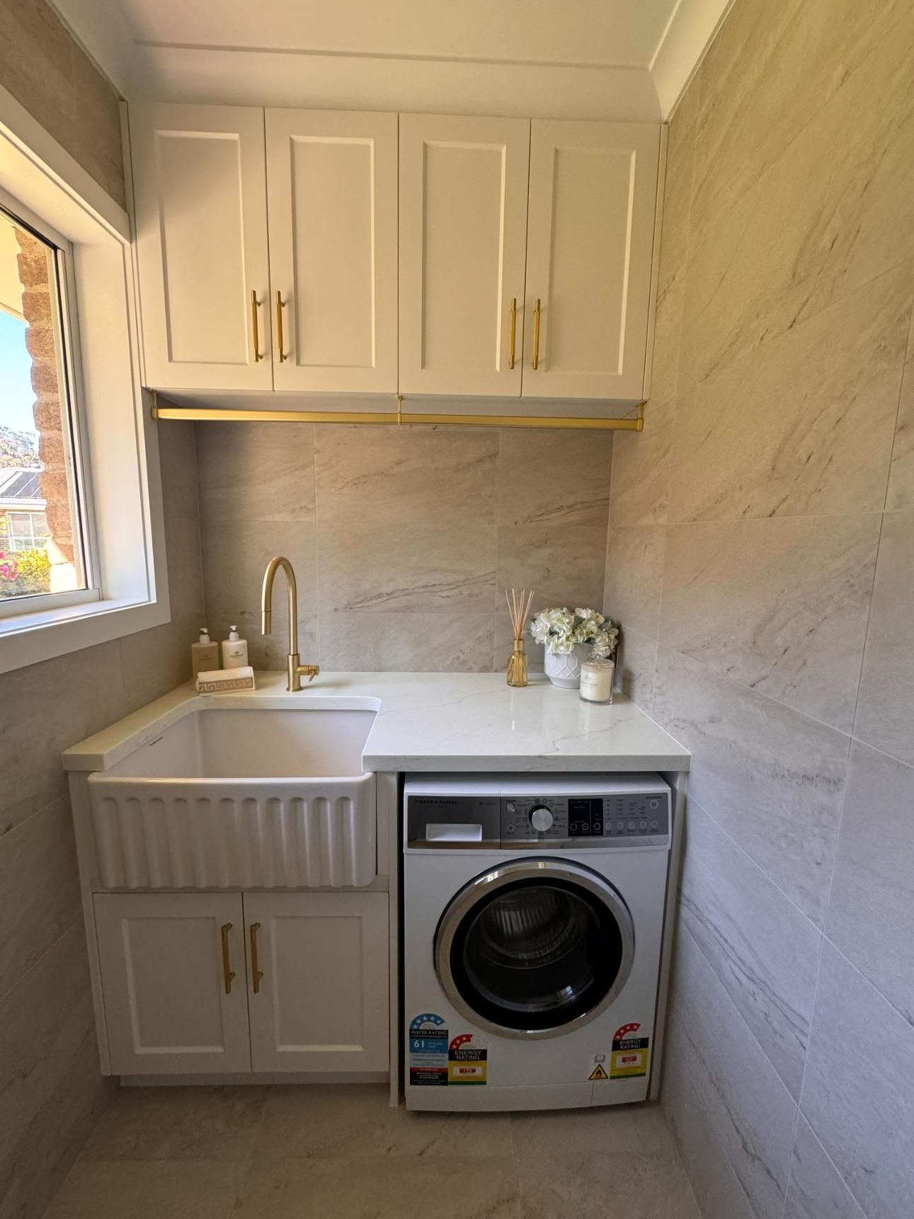 Laundry Room With White Cabinets, Gold Hardware — J&C Quality Construction in Goulburn, NSW