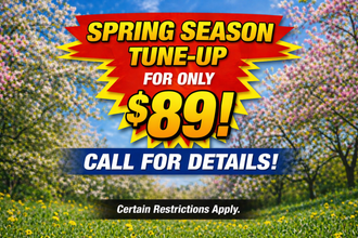 Spring season tune-up ad: $89, call for details, over blooming trees and flowers.