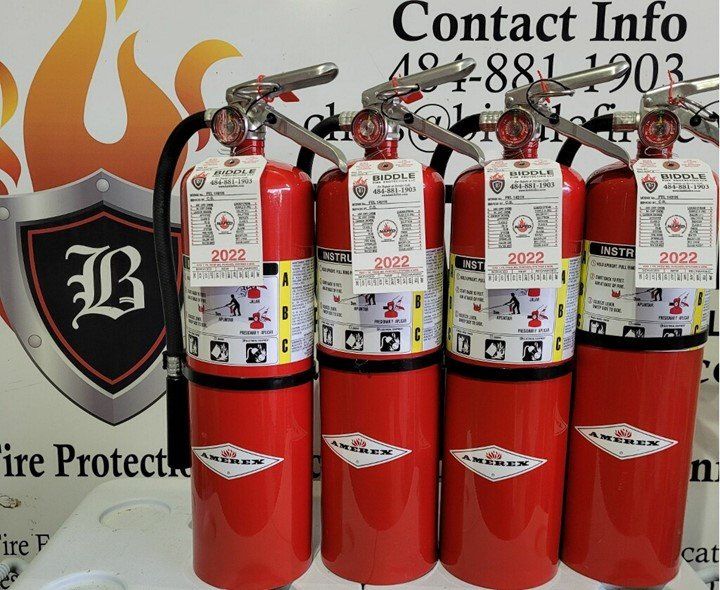 Four Fire Extinguishers Standing — Fire Extinguisher in Coatesville, PA