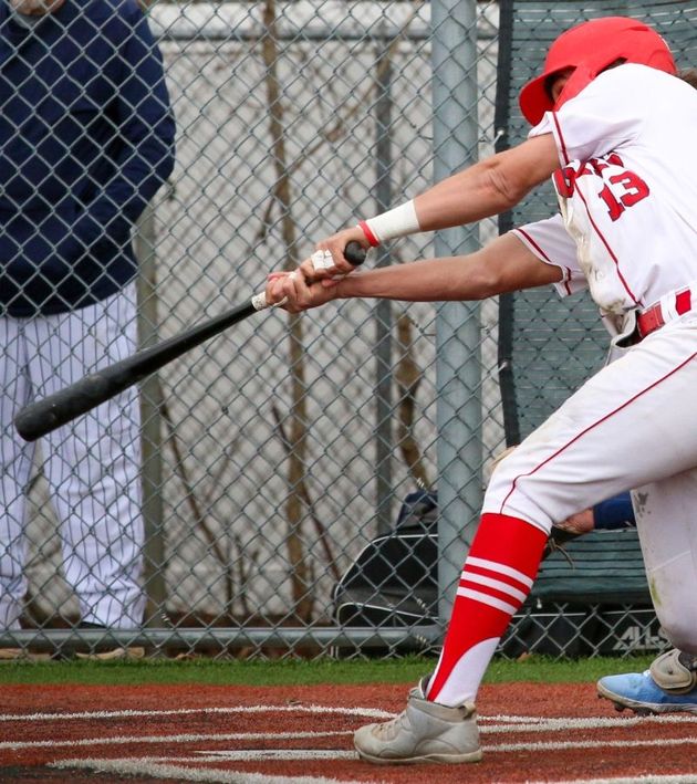 A baseball player with the number 13 on his jersey