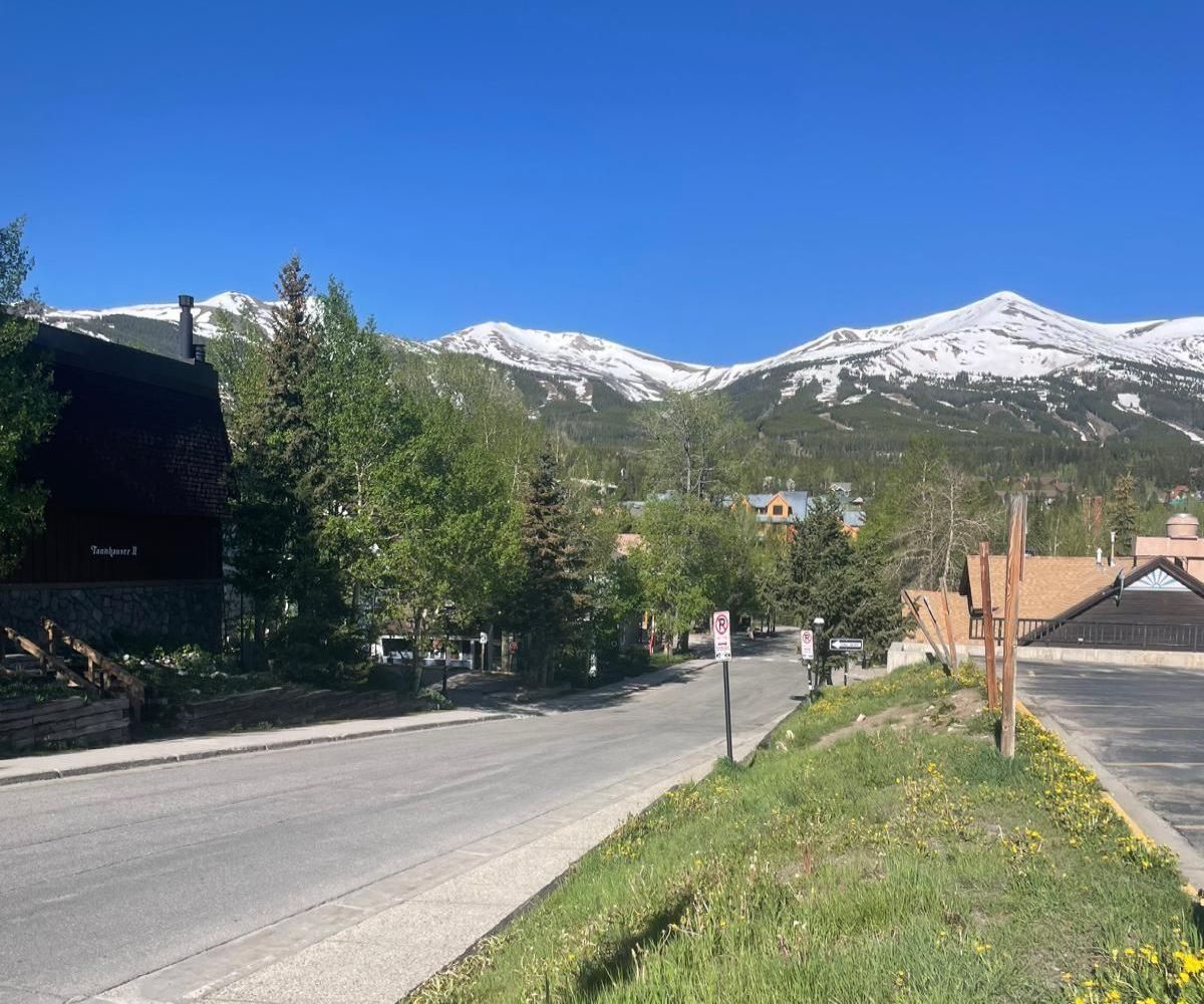 View of the colorado mountains from the road in a small town