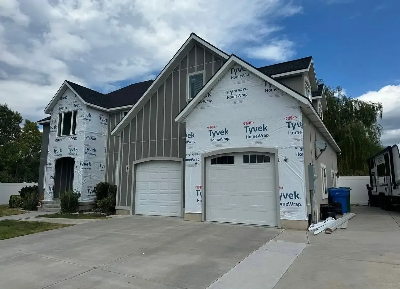 A house is being built with a lot of insulation on it.