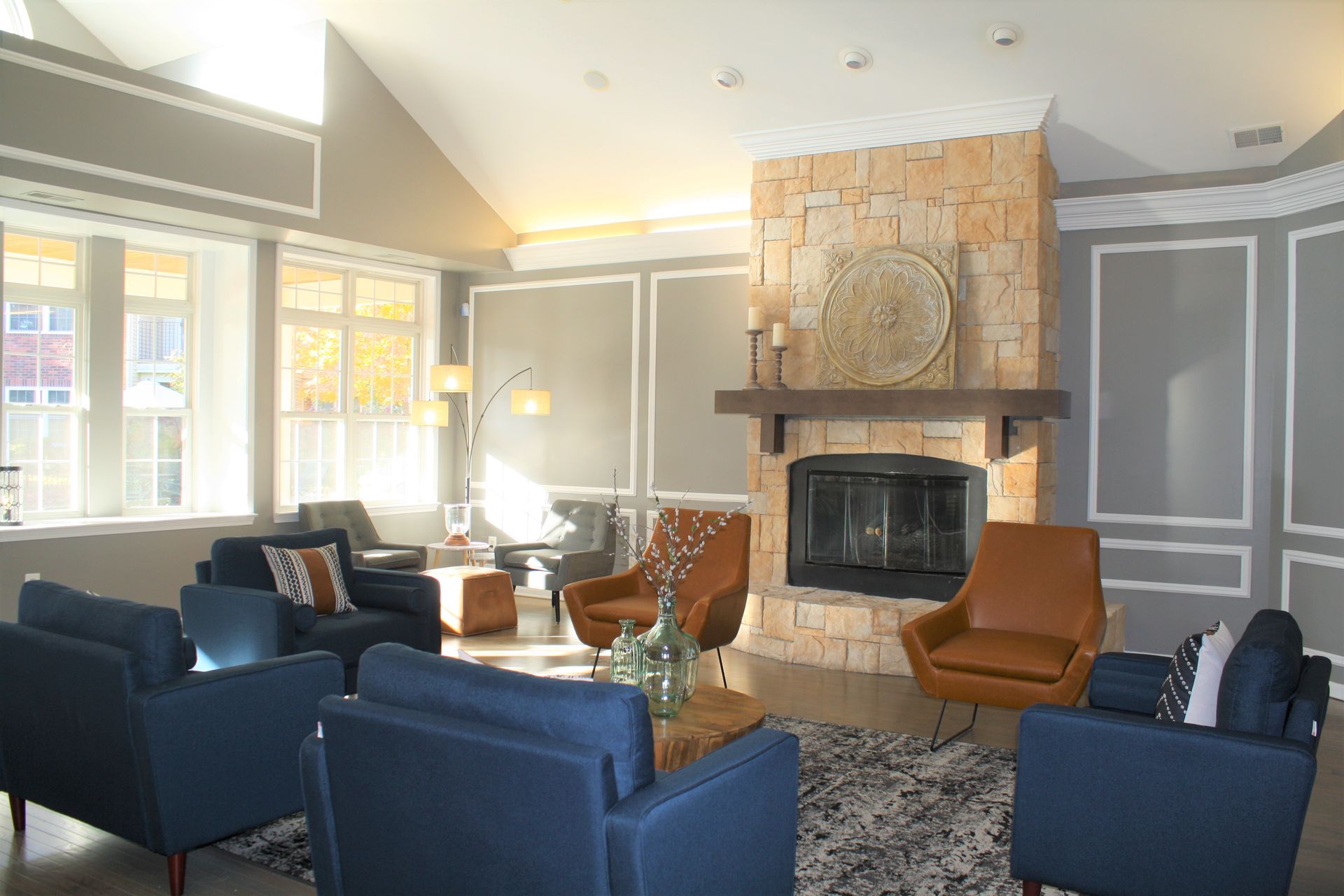 A living room filled with furniture and a fireplace.