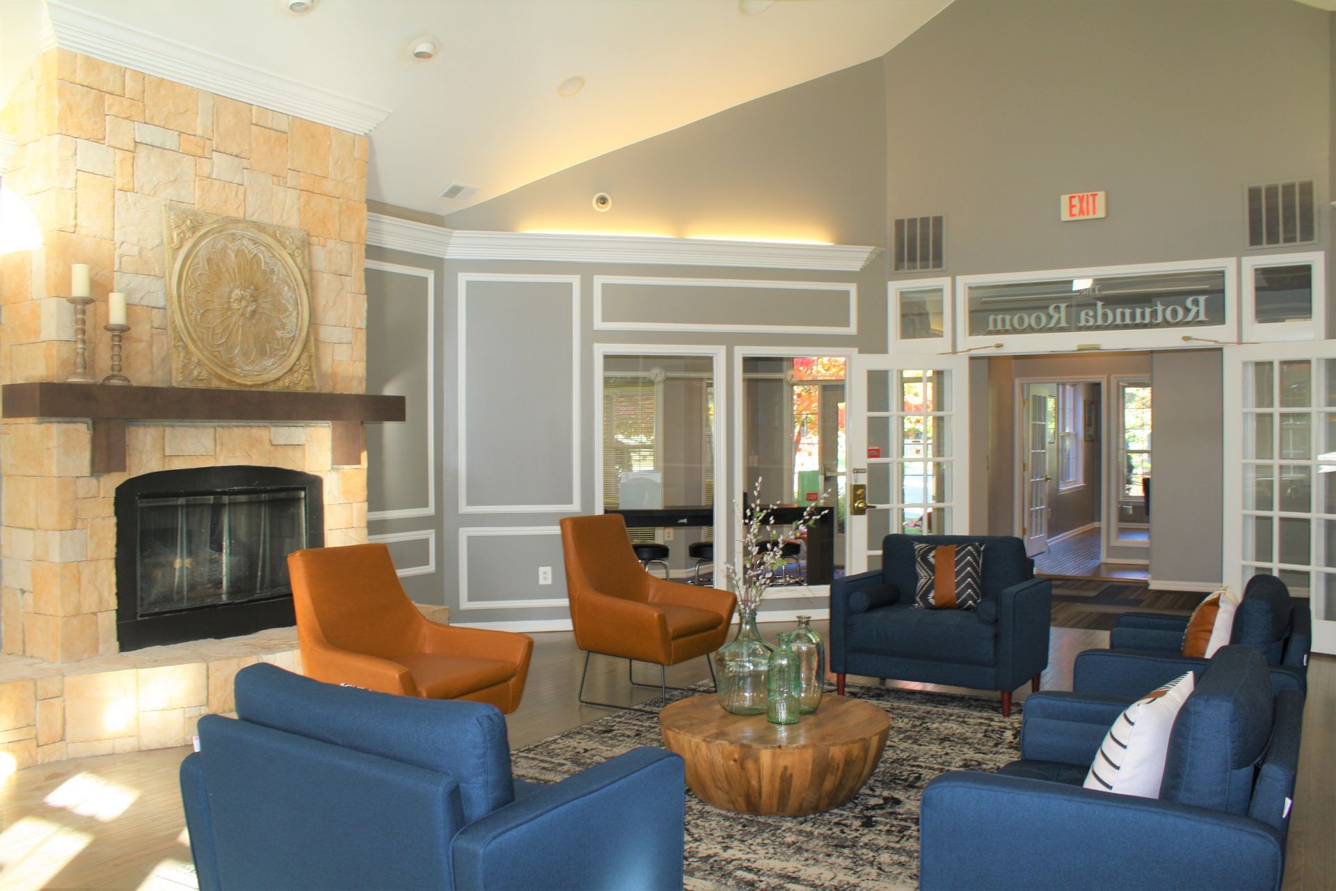 A living room filled with furniture and a fireplace.