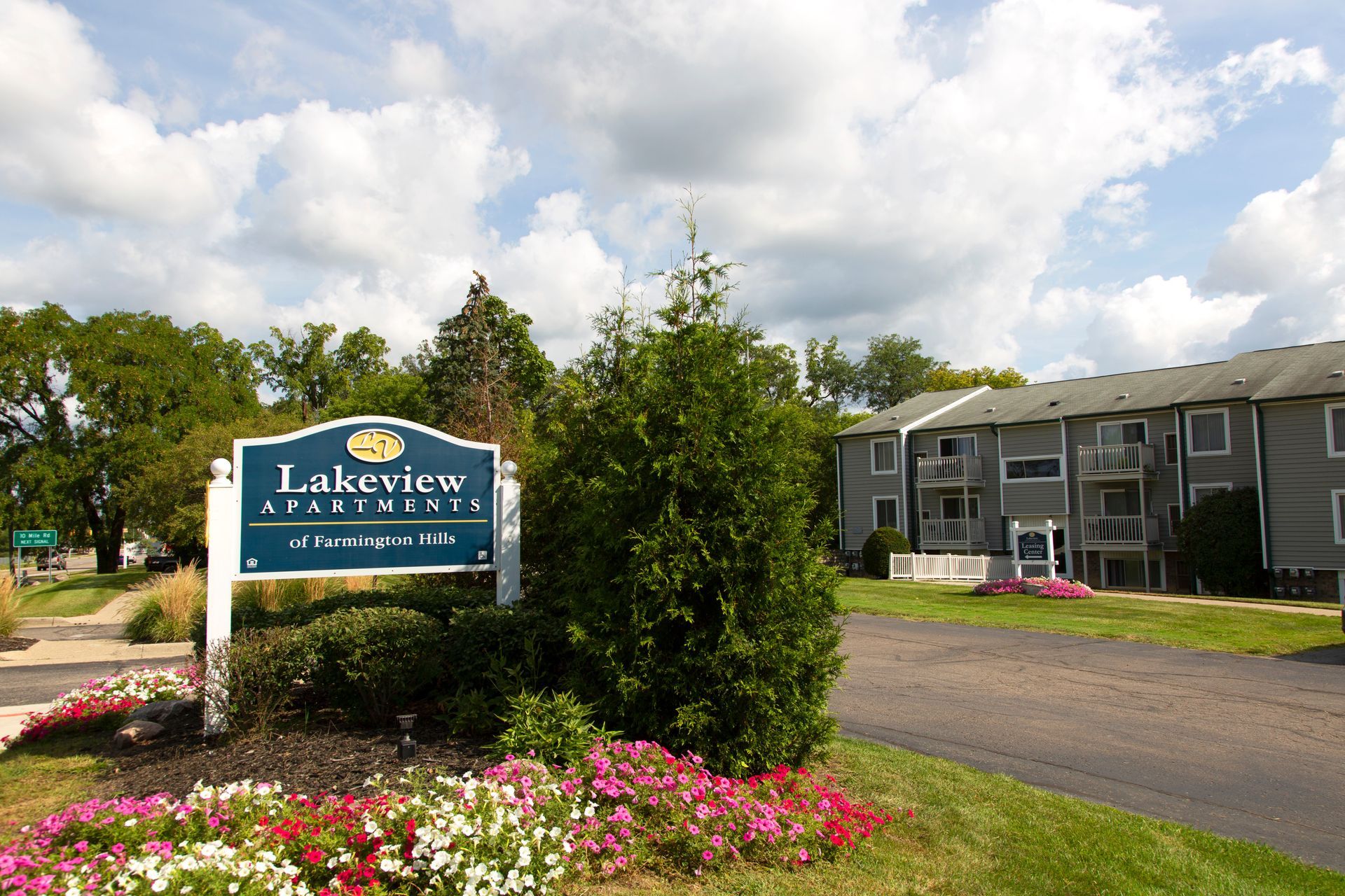 A sign for lakeview apartments is in front of a building