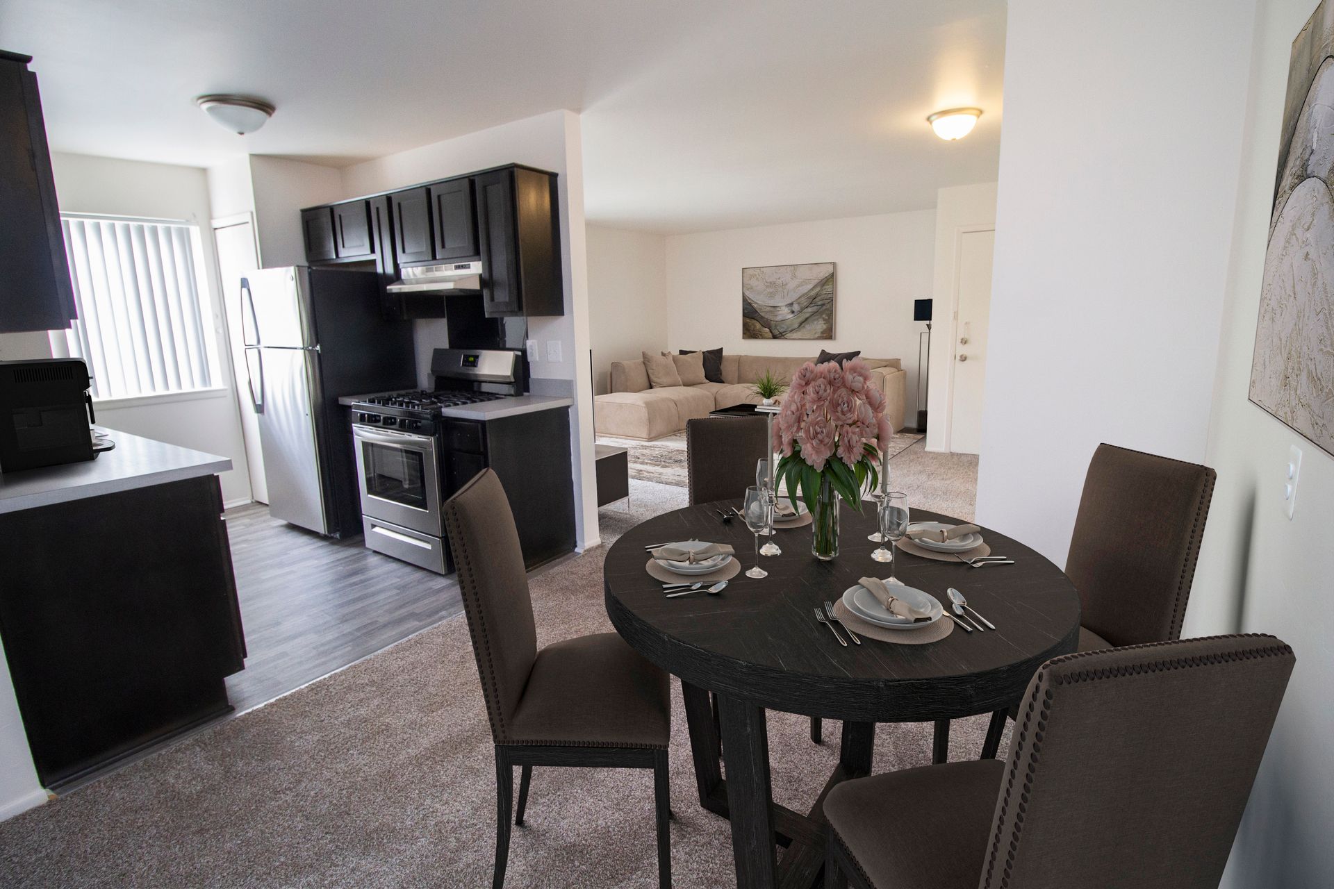 A dining room table and chairs in a house