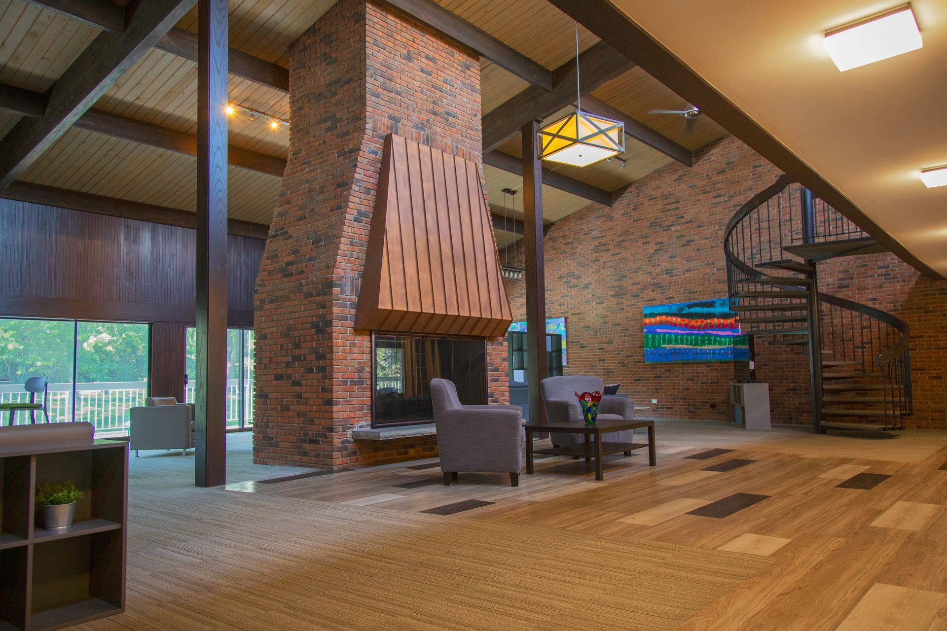 There is a spiral staircase in the middle of the room.