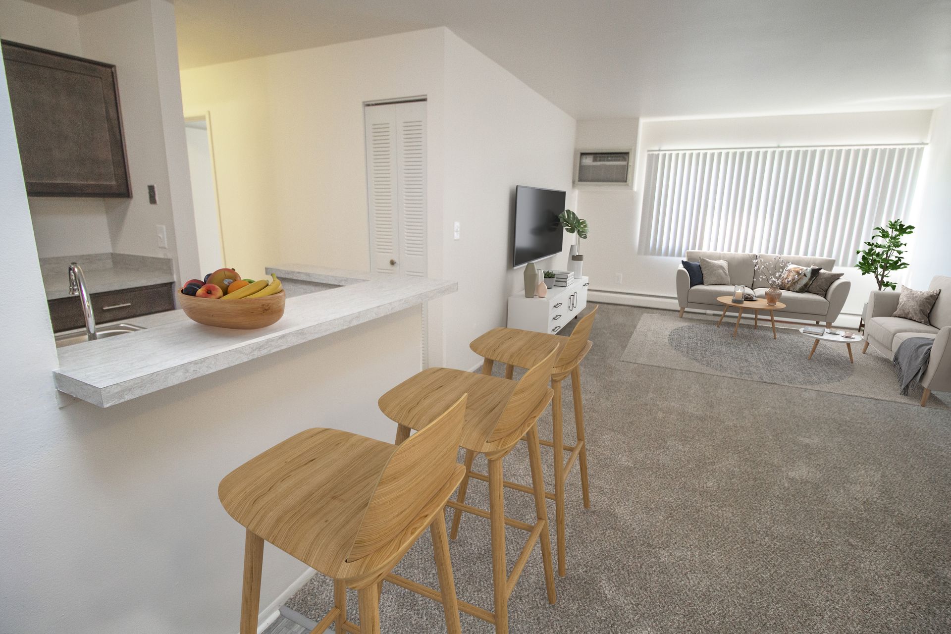 A living room with a couch , chairs , and a television.