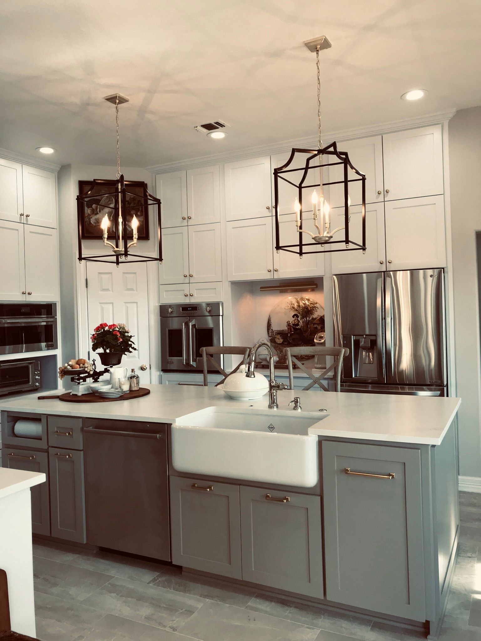 Modern kitchen remodel with white shaker cabinets and granite countertops