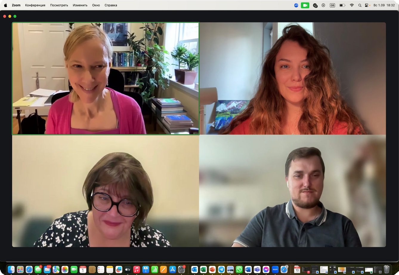 A group of people are having a video call on a computer screen.