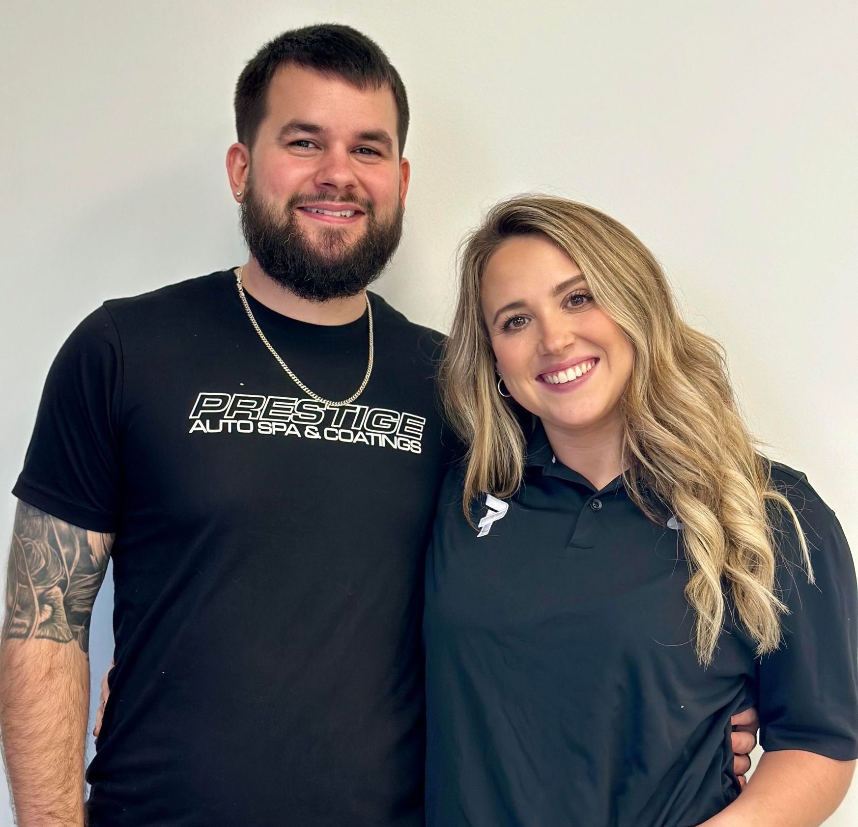 A man and a woman are posing for a picture together.