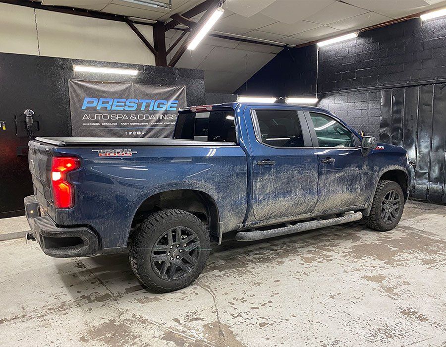 dirty blue pick up that needs auto detailing