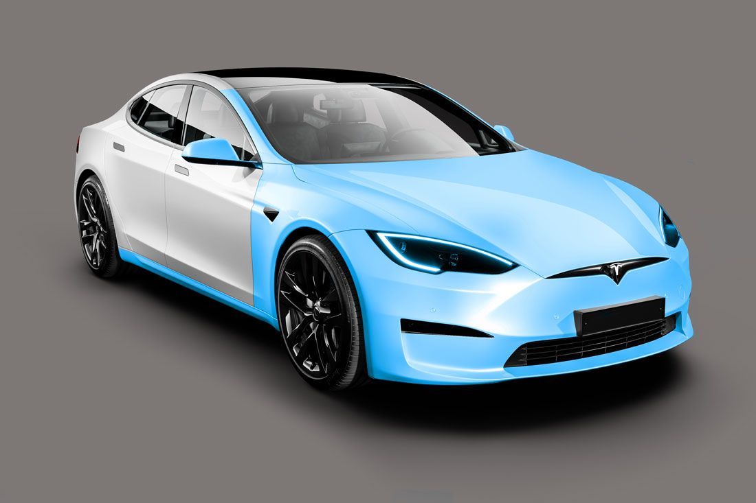 A blue and white tesla model s with a gray background.