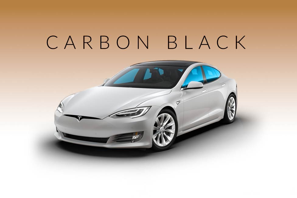 A white tesla model s is shown in carbon black