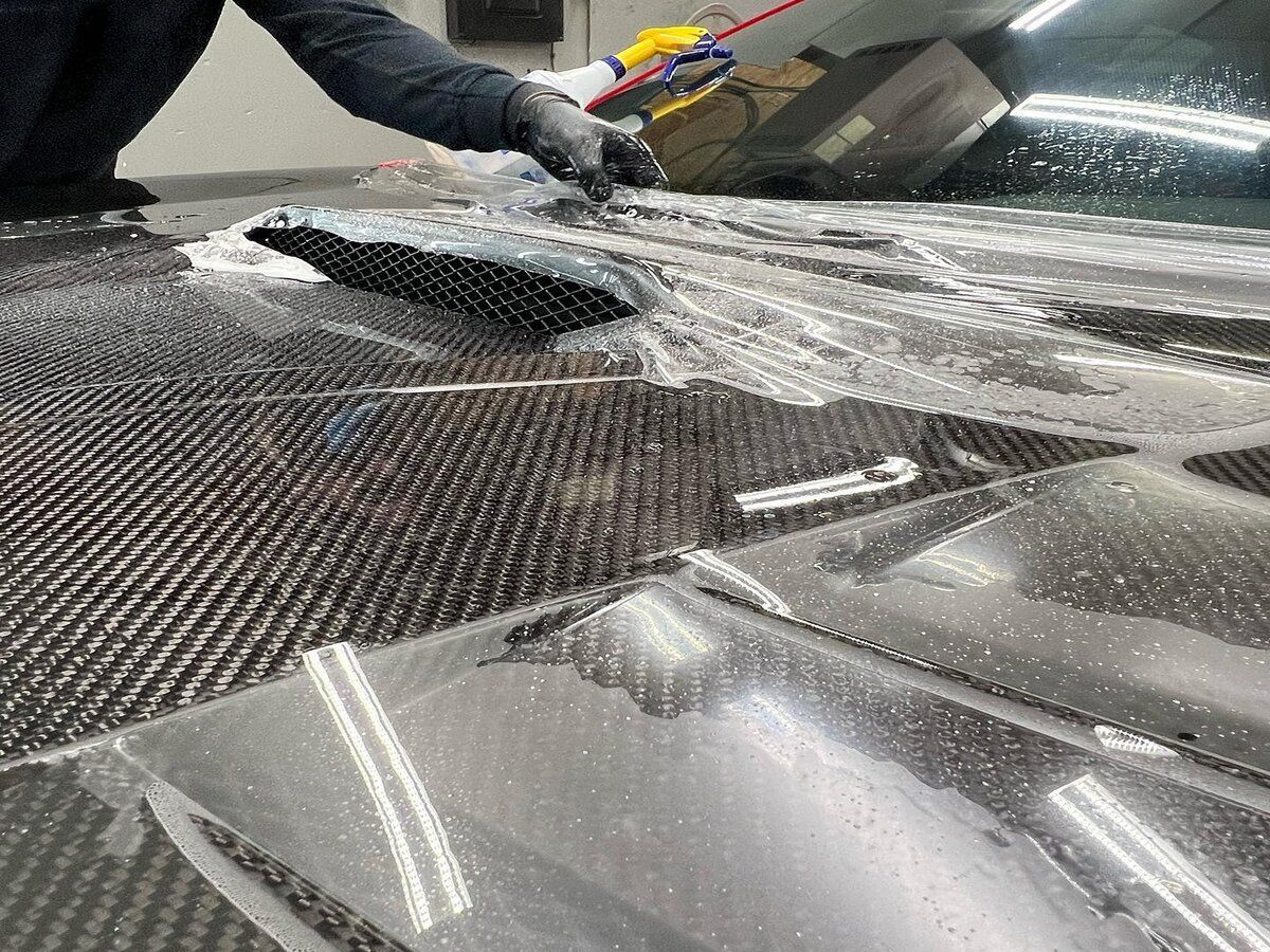 ppf installation on a carbon fiber hood