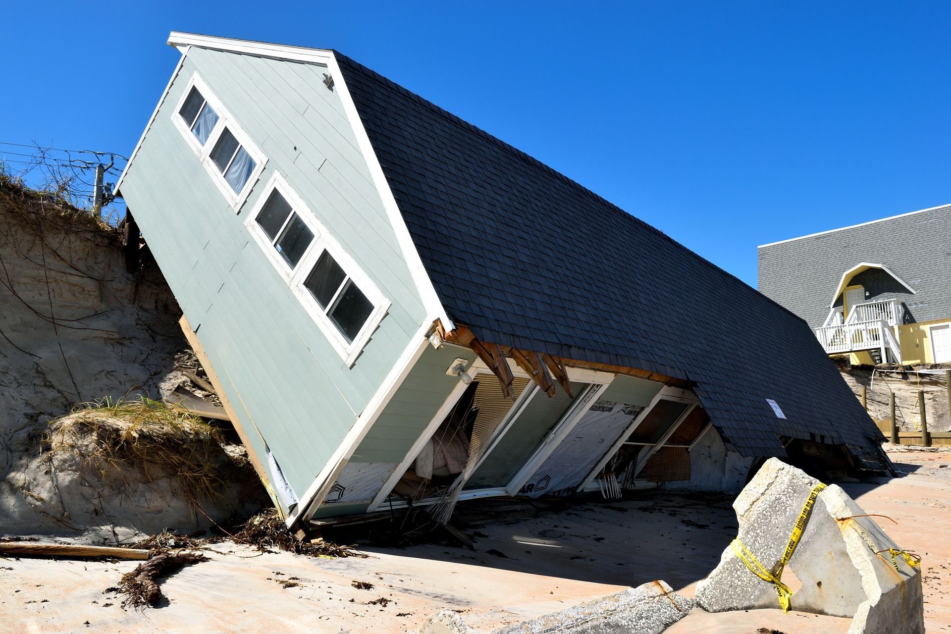 A house that has been upside down in the sand