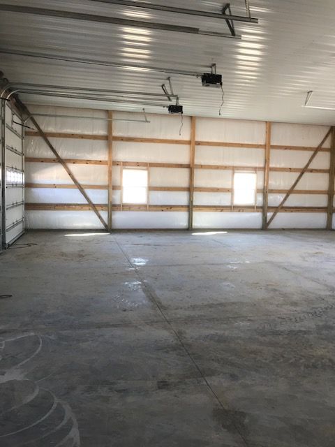 A large empty building with a lot of windows