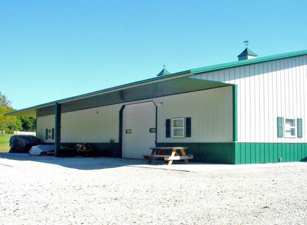 A green and white building with the number 13 on the side