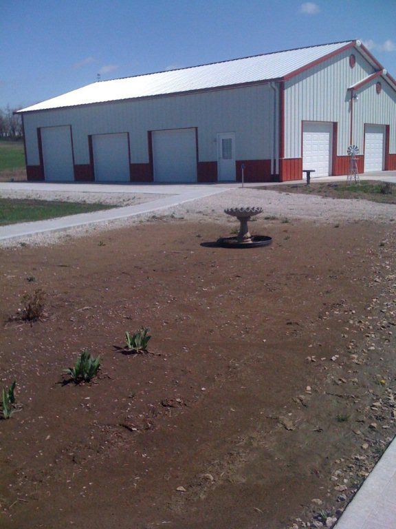 A large building with a bird bath in front of it