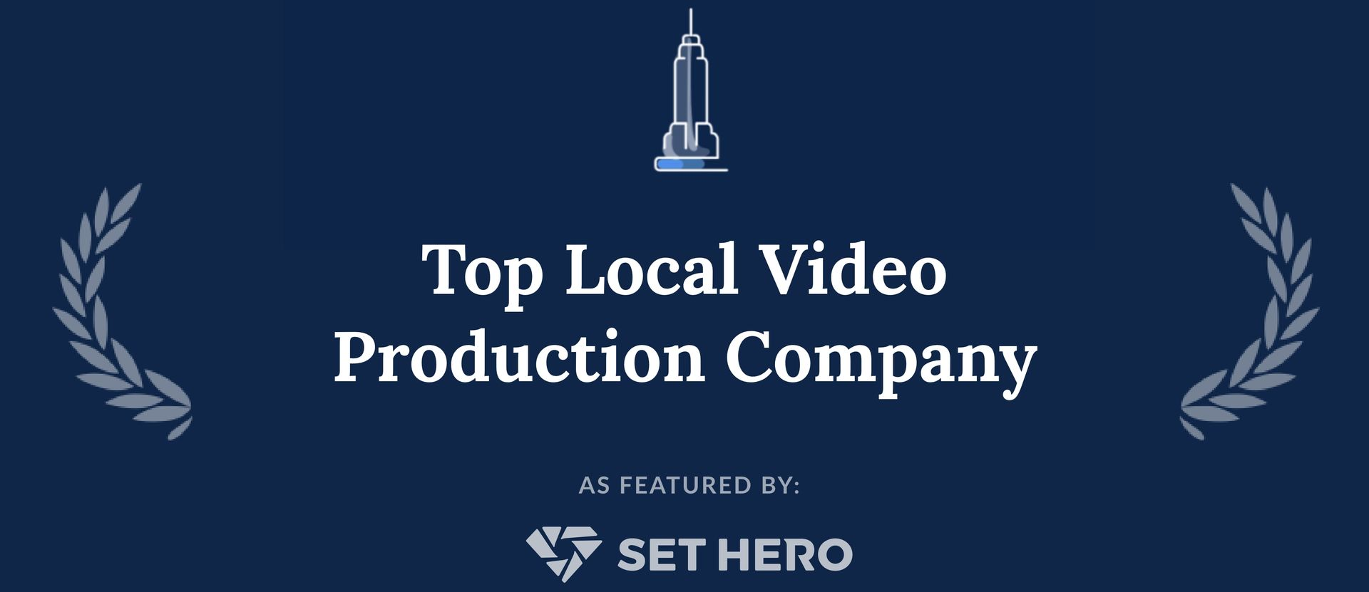 A dark blue badge with white text reading