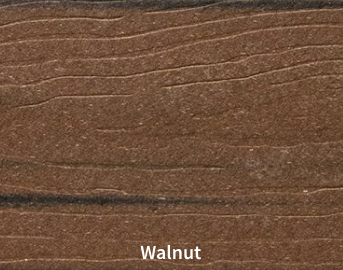 Un gros plan d'un morceau de bois avec le mot noyer dessus.