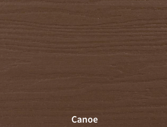 Un gros plan d'un morceau de bois avec le mot canoë dessus