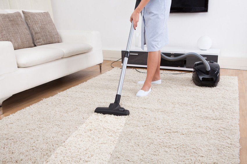 Carpet with vacuum cleaner