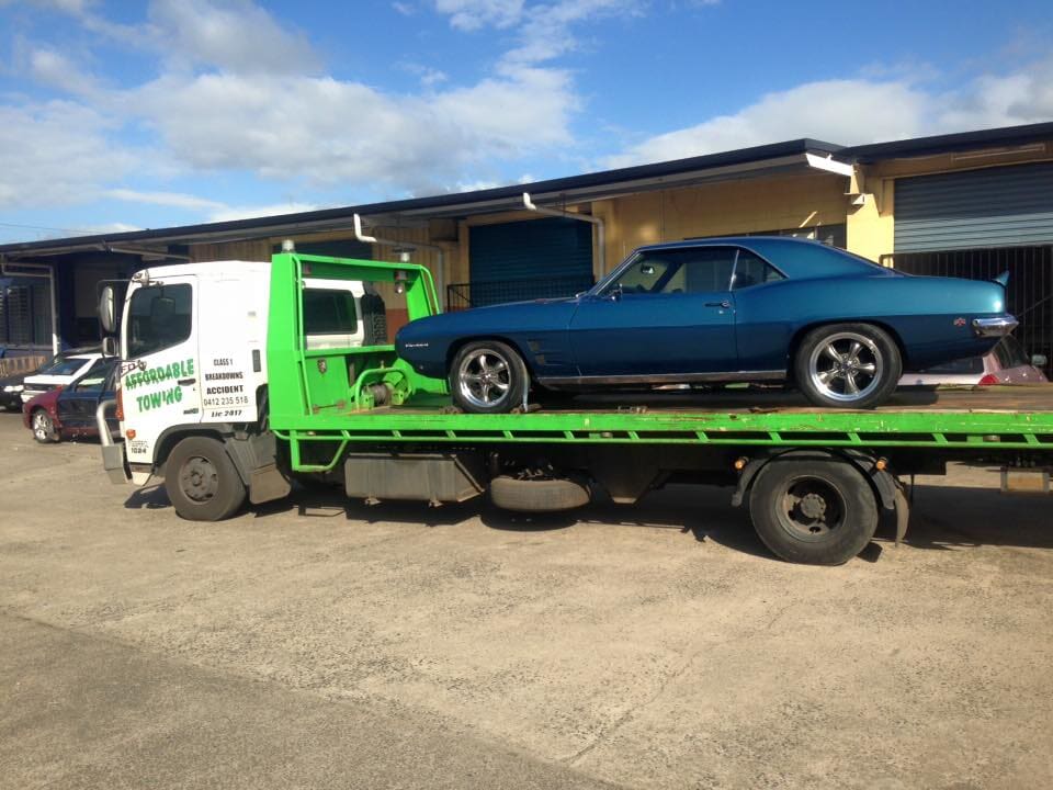 Blue Car on Tow Tray - Towing Services in Mount Sheridan, QLD