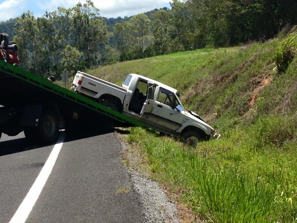 Car being Pulled onto Tow Tray - Towing Services in Mount Sheridan, QLD