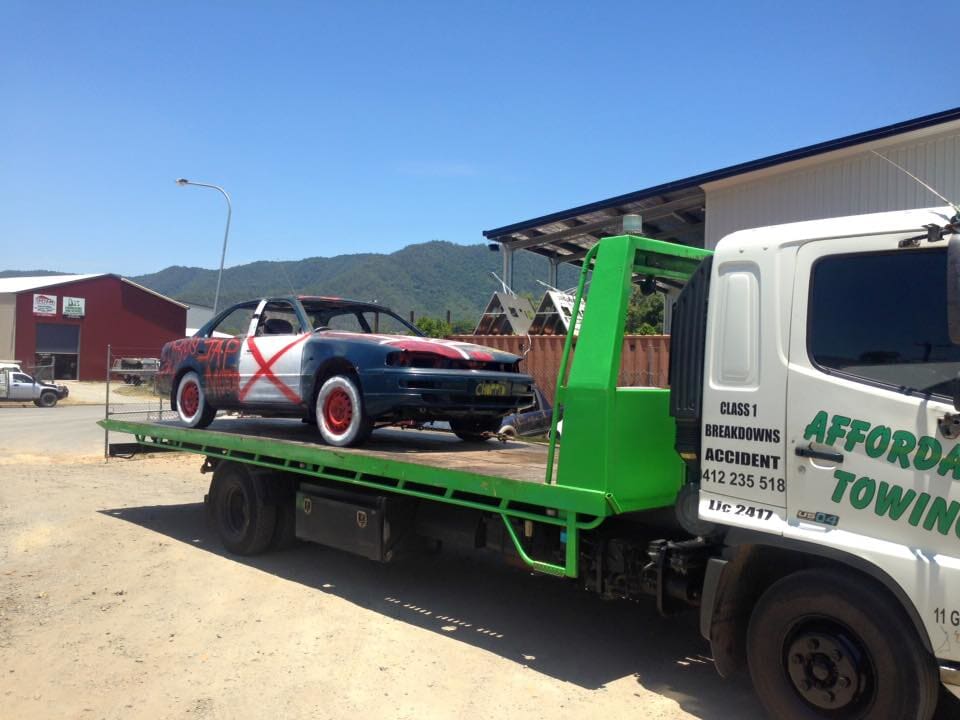 Spray Painted Car on Tow Tray - Towing Services in Mount Sheridan, QLD