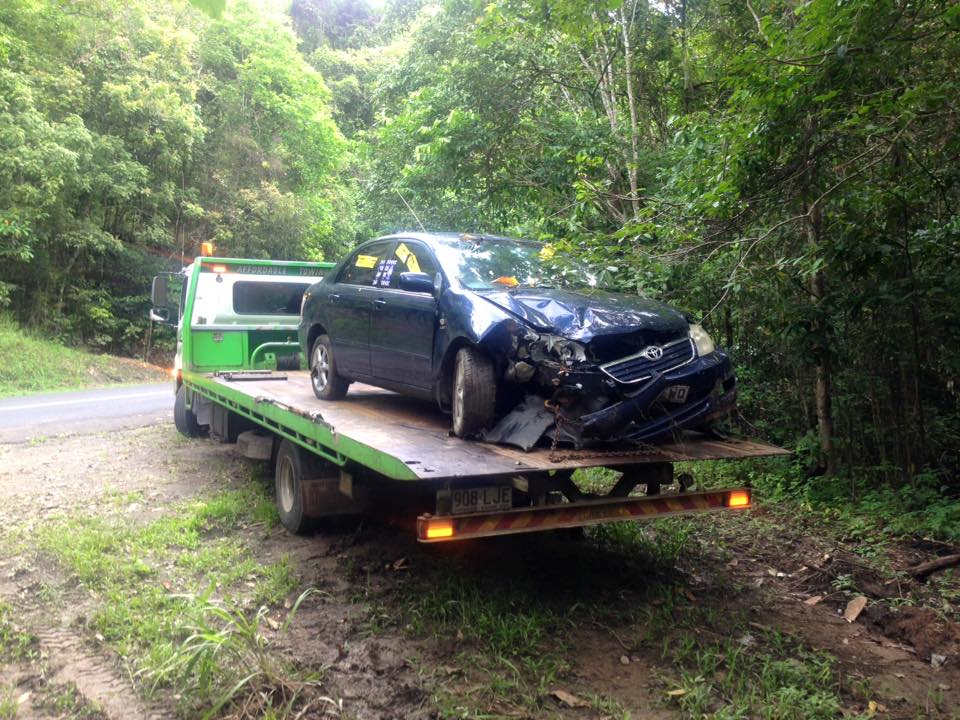 Tow Truck Transporting Black Car - Towing Services in Mount Sheridan, QLD