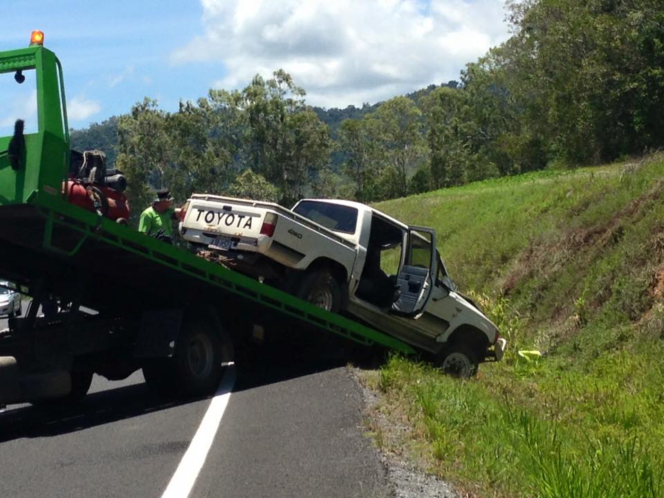 Toyota Ute being Lifted onto Tow Tray - Towing Services in Mount Sheridan, QLD