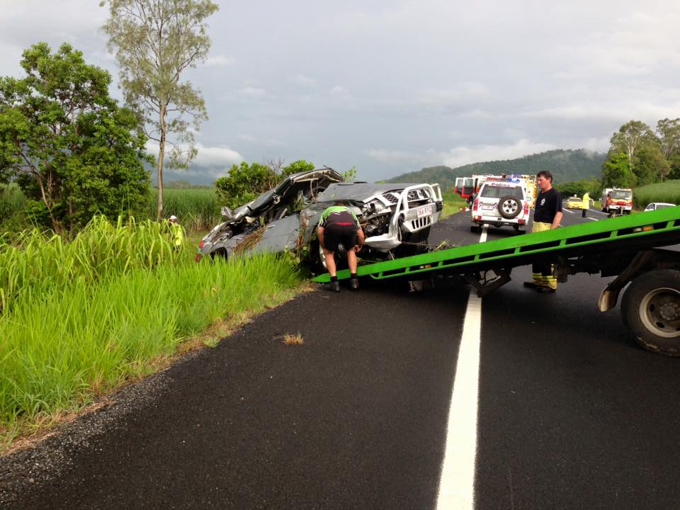 Workers Pulling Car onto Tow Truck - Towing Services in Mount Sheridan, QLD