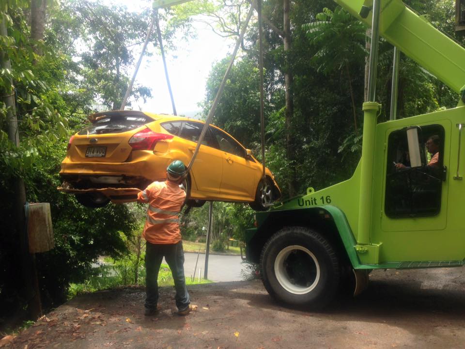 Yellow Car Pulled onto Tow Truck - Towing Services in Mount Sheridan, QLD